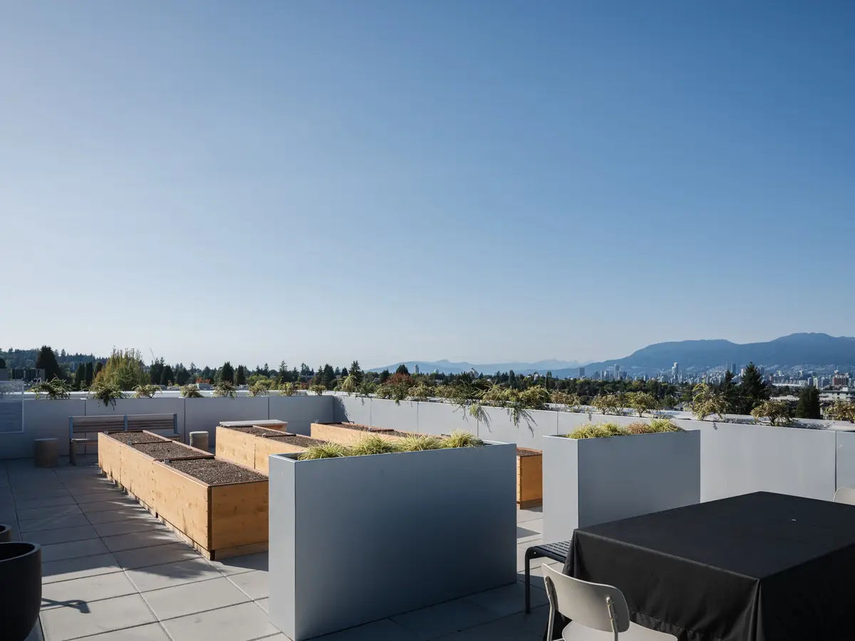 The roof deck, planters, and mountains on the horizon