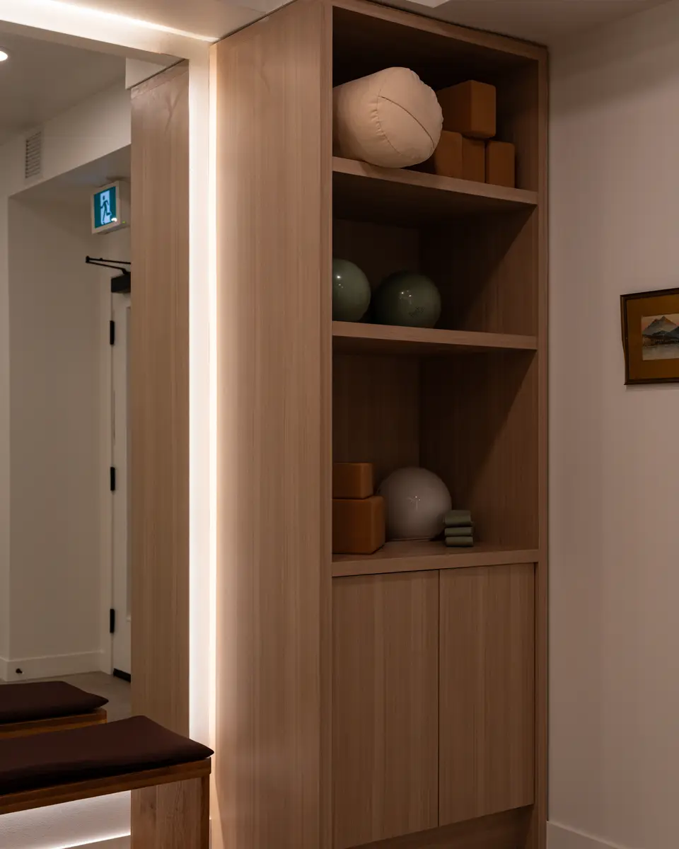 A lit wood shelf in the suite