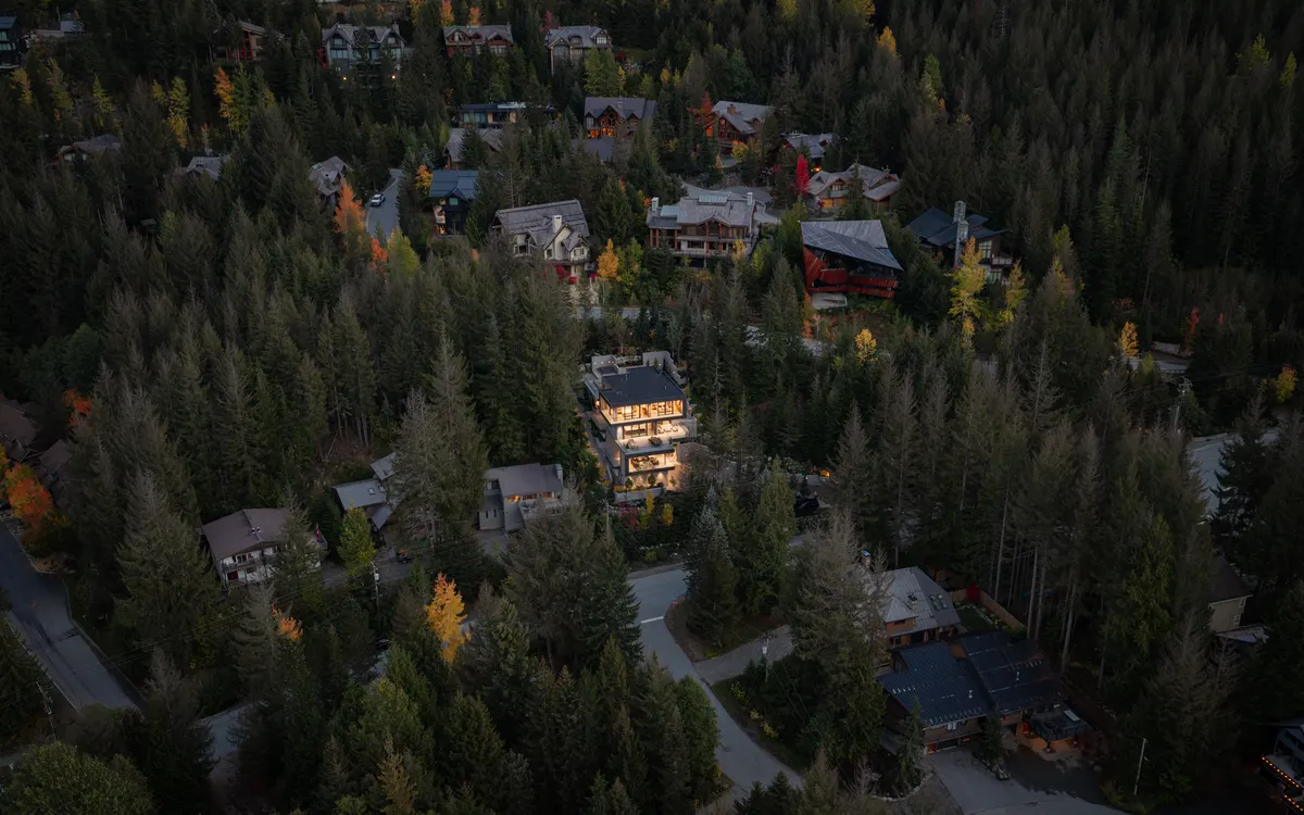 The house in the firs, other houses beyond, from above, Panorama Ridge, Whistler