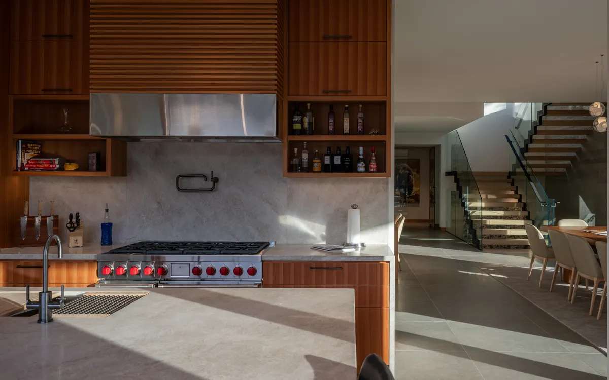 The kitchen range, open shelves, and the stair beyond, Panorama Ridge, Whistler