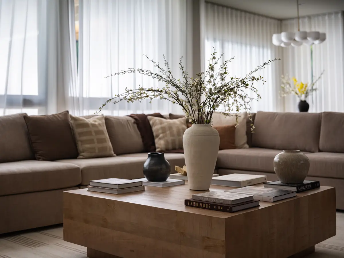 A sofa and a wood coffee table