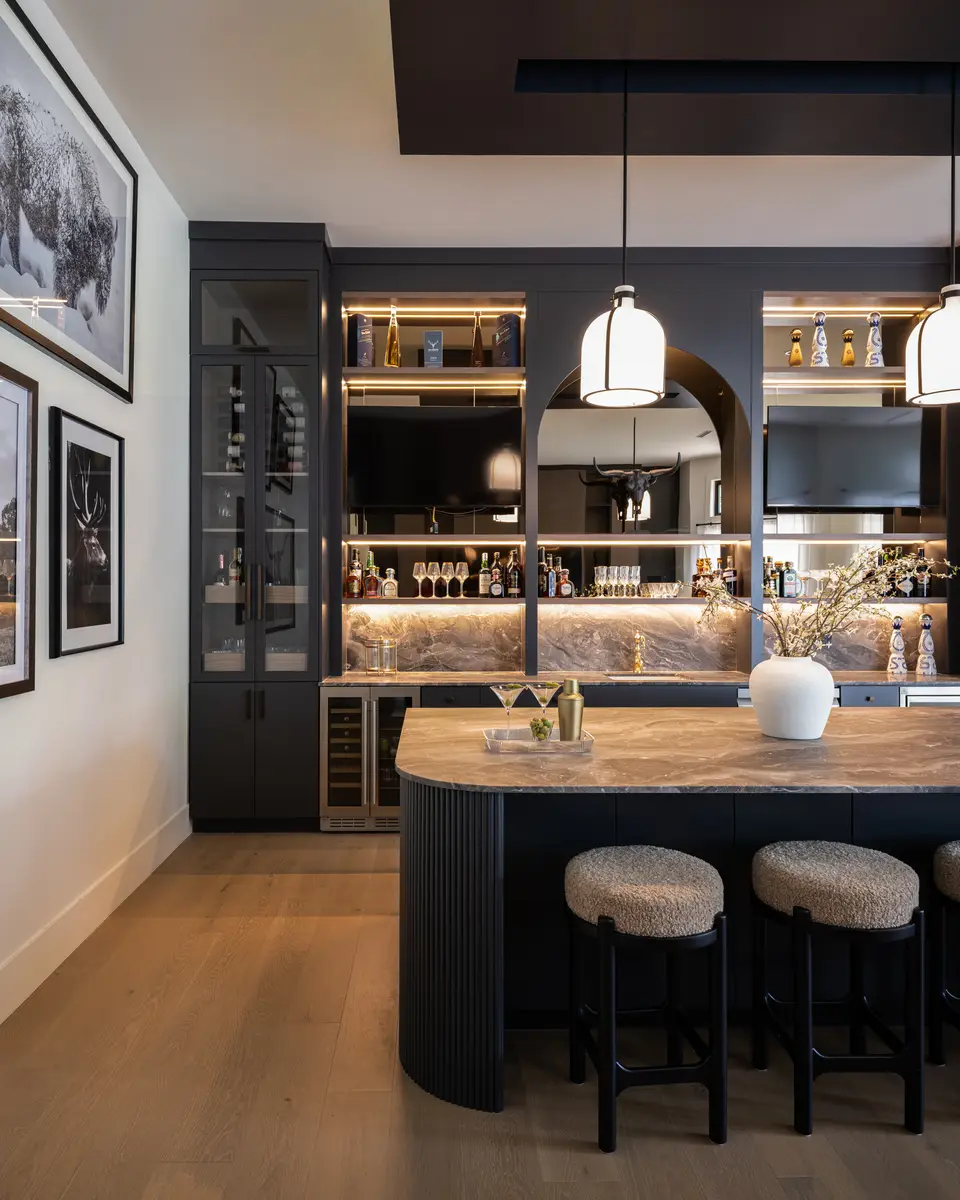 The bar from the end, stools along the stone top