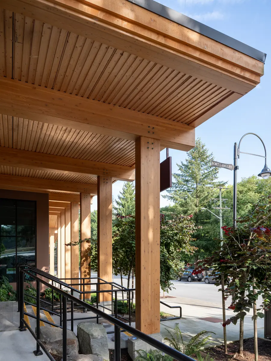 Timber columns and the wood soffit at the colonnade