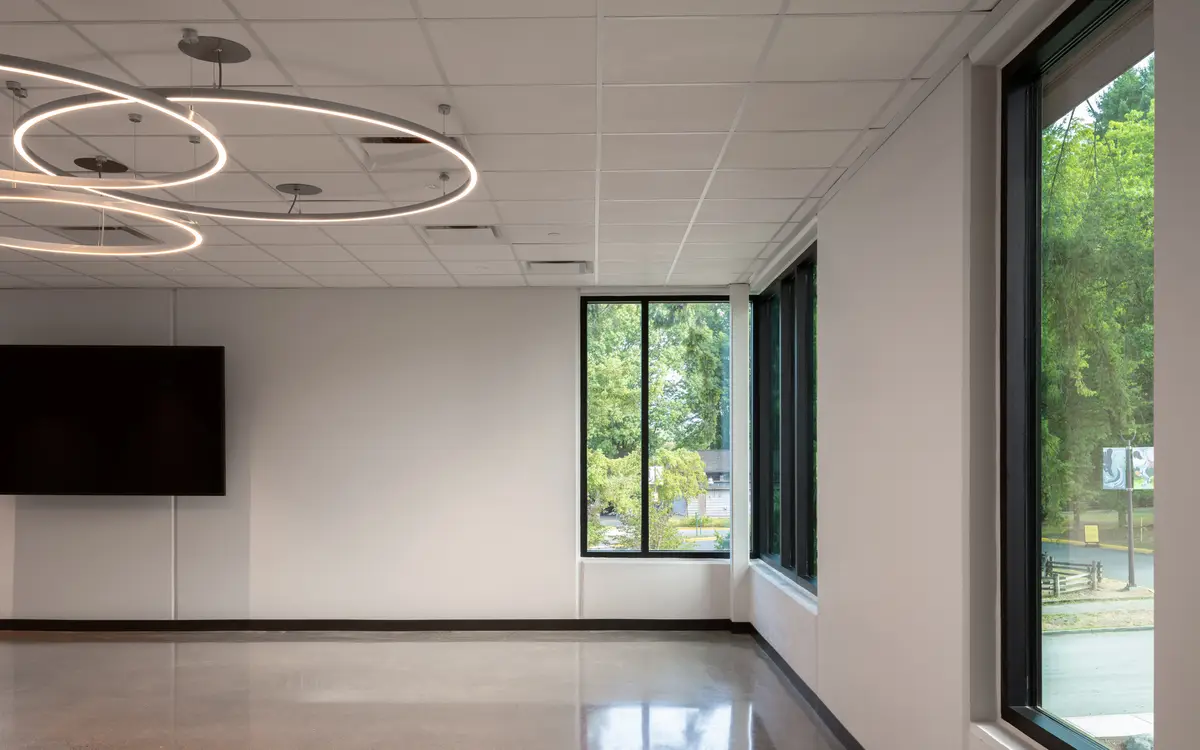 The hall along the windows, a screen on the end wall