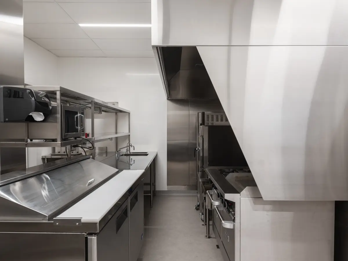 Stainless counters and shelves in the kitchen