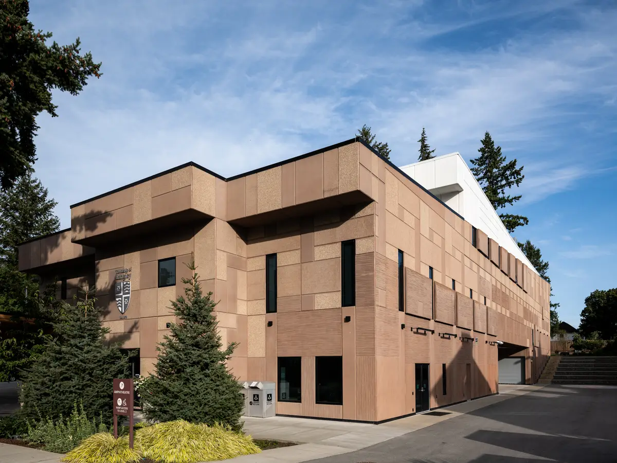 The building's corner, panel cladding and a band of glazing