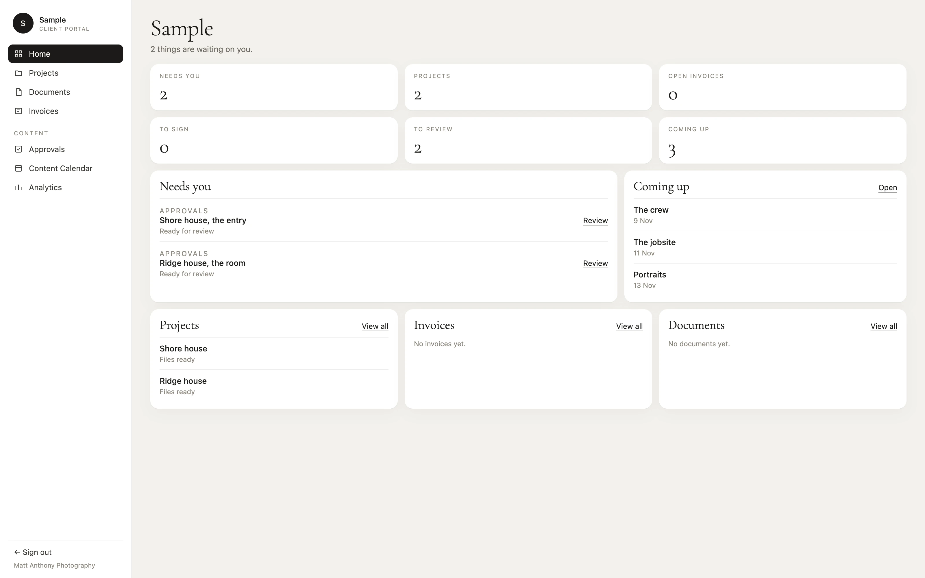 Sample portal home. Two posts waiting for review. Not a live count.