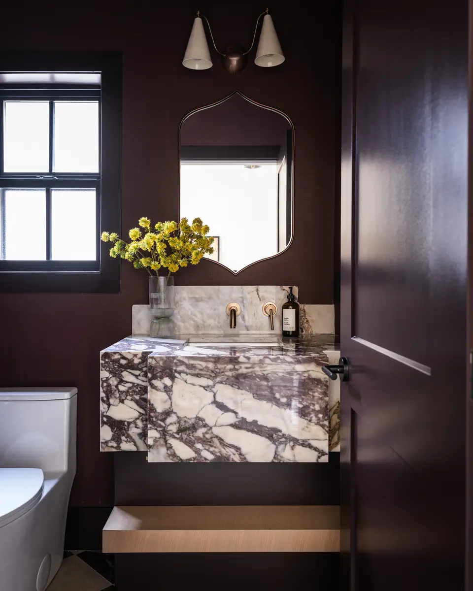 The vanity under a black-framed window