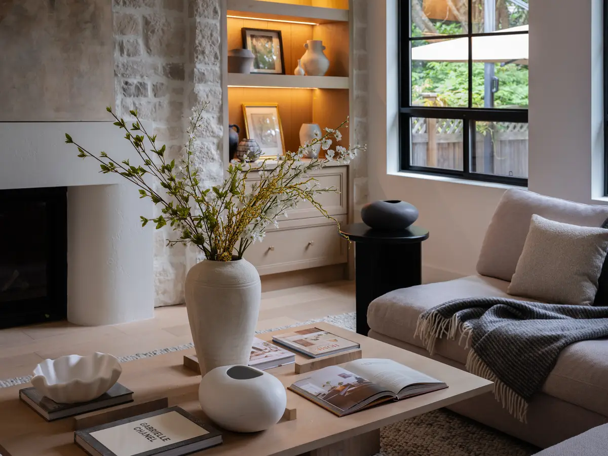 A sofa, a low table, and the lit niche